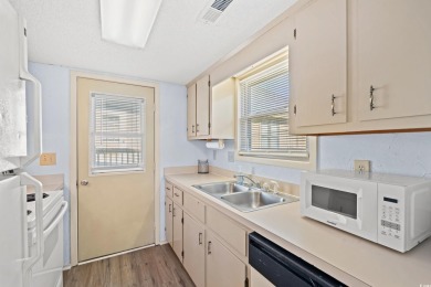 Beautiful raised Beach Home, only 2 blocks from the Beach!  This on The Dunes Golf and Beach Club in South Carolina - for sale on GolfHomes.com, golf home, golf lot