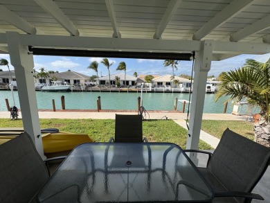 Great weekend getaway, retirement home or vacation rental on 9th on Key Colony Beach Golf Course in Florida - for sale on GolfHomes.com, golf home, golf lot