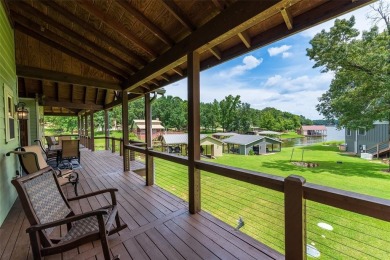 Welcome to 109 King Shore Blvd, a luxury waterfront retreat in on Cypress Creek Country Club in Texas - for sale on GolfHomes.com, golf home, golf lot