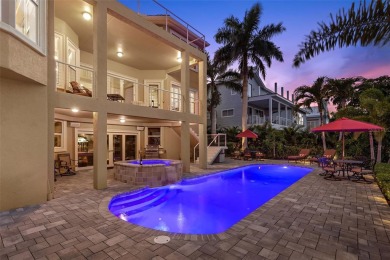 Welcome to a stunning custom waterfront home in the prestigious on Pasadena Yacht and Country Club in Florida - for sale on GolfHomes.com, golf home, golf lot