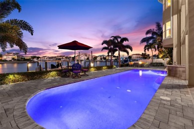 Welcome to a stunning custom waterfront home in the prestigious on Pasadena Yacht and Country Club in Florida - for sale on GolfHomes.com, golf home, golf lot