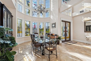 Welcome to a stunning custom waterfront home in the prestigious on Pasadena Yacht and Country Club in Florida - for sale on GolfHomes.com, golf home, golf lot