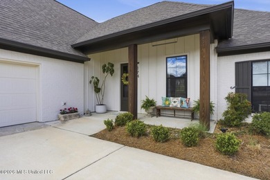 Welcome to the lap of luxury in Lake Caroline, where everyday on Lake Caroline Golf Club in Mississippi - for sale on GolfHomes.com, golf home, golf lot