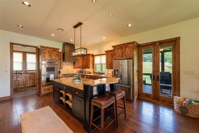 Welcome to 109 King Shore Blvd, a luxury waterfront retreat in on Cypress Creek Country Club in Texas - for sale on GolfHomes.com, golf home, golf lot