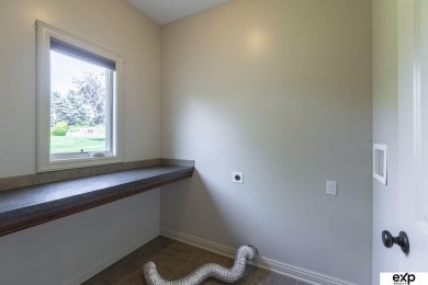This stunning PRE-INSPECTED west-facing 2-story home sits on a 0 on Tiburon Golf Club in Nebraska - for sale on GolfHomes.com, golf home, golf lot