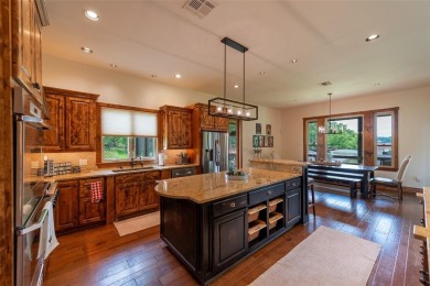 Welcome to 109 King Shore Blvd, a luxury waterfront retreat in on Cypress Creek Country Club in Texas - for sale on GolfHomes.com, golf home, golf lot
