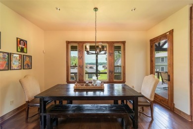Welcome to 109 King Shore Blvd, a luxury waterfront retreat in on Cypress Creek Country Club in Texas - for sale on GolfHomes.com, golf home, golf lot
