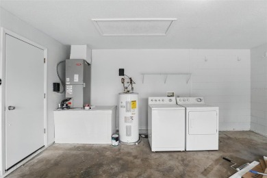 **This property qualifies for a closing cost credit up to $6,500 on Wedgefield Golf Club in Florida - for sale on GolfHomes.com, golf home, golf lot