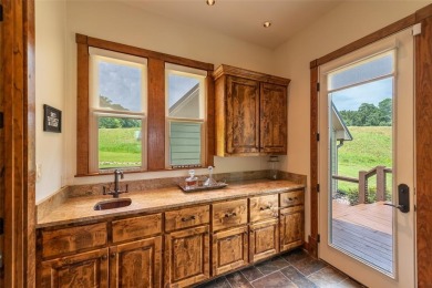 Welcome to 109 King Shore Blvd, a luxury waterfront retreat in on Cypress Creek Country Club in Texas - for sale on GolfHomes.com, golf home, golf lot