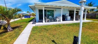 Great weekend getaway, retirement home or vacation rental on 9th on Key Colony Beach Golf Course in Florida - for sale on GolfHomes.com, golf home, golf lot