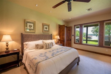 Welcome to 109 King Shore Blvd, a luxury waterfront retreat in on Cypress Creek Country Club in Texas - for sale on GolfHomes.com, golf home, golf lot