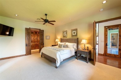 Welcome to 109 King Shore Blvd, a luxury waterfront retreat in on Cypress Creek Country Club in Texas - for sale on GolfHomes.com, golf home, golf lot