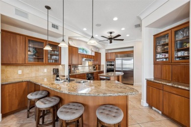 Welcome to a stunning custom waterfront home in the prestigious on Pasadena Yacht and Country Club in Florida - for sale on GolfHomes.com, golf home, golf lot