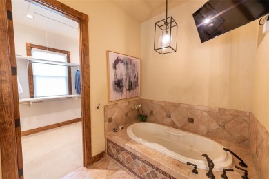 Welcome to 109 King Shore Blvd, a luxury waterfront retreat in on Cypress Creek Country Club in Texas - for sale on GolfHomes.com, golf home, golf lot