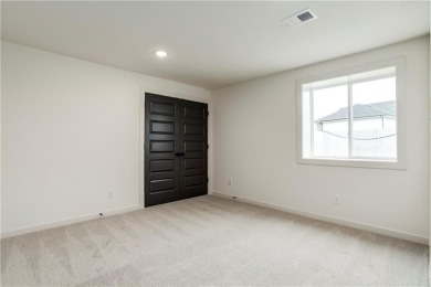 The Woodland II reverse 1.5 story plan offers 5 bedrooms, 3 full on Heritage Park Golf Course in Kansas - for sale on GolfHomes.com, golf home, golf lot