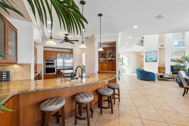 Welcome to a stunning custom waterfront home in the prestigious on Pasadena Yacht and Country Club in Florida - for sale on GolfHomes.com, golf home, golf lot