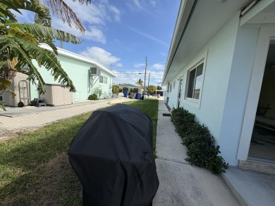 Great weekend getaway, retirement home or vacation rental on 9th on Key Colony Beach Golf Course in Florida - for sale on GolfHomes.com, golf home, golf lot