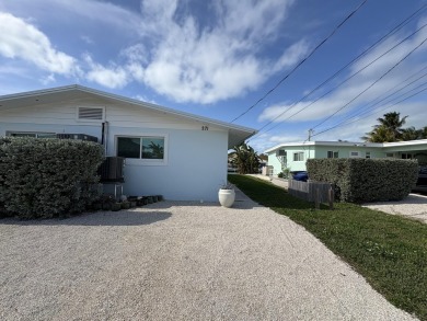 Great weekend getaway, retirement home or vacation rental on 9th on Key Colony Beach Golf Course in Florida - for sale on GolfHomes.com, golf home, golf lot