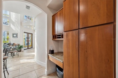 Welcome to a stunning custom waterfront home in the prestigious on Pasadena Yacht and Country Club in Florida - for sale on GolfHomes.com, golf home, golf lot