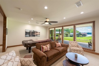 Welcome to 109 King Shore Blvd, a luxury waterfront retreat in on Cypress Creek Country Club in Texas - for sale on GolfHomes.com, golf home, golf lot