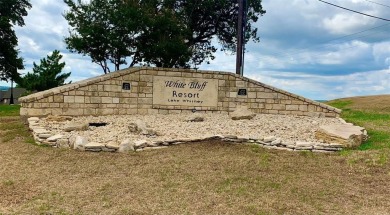 Welcome to your perfect getaway! This beautiful .5-acre vacant on White Bluff Resort - New Course in Texas - for sale on GolfHomes.com, golf home, golf lot