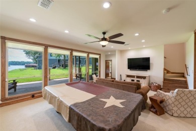 Welcome to 109 King Shore Blvd, a luxury waterfront retreat in on Cypress Creek Country Club in Texas - for sale on GolfHomes.com, golf home, golf lot