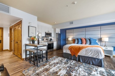 GOLF + SKI IN/OUT corner condo in the iconic Lodge at Osprey on Osprey Meadows at Tamarack Resort in Idaho - for sale on GolfHomes.com, golf home, golf lot