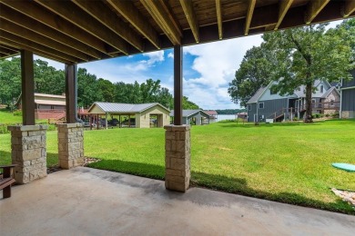 Welcome to 109 King Shore Blvd, a luxury waterfront retreat in on Cypress Creek Country Club in Texas - for sale on GolfHomes.com, golf home, golf lot