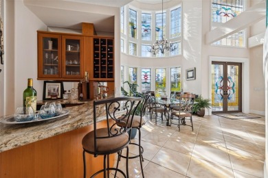 Welcome to a stunning custom waterfront home in the prestigious on Pasadena Yacht and Country Club in Florida - for sale on GolfHomes.com, golf home, golf lot
