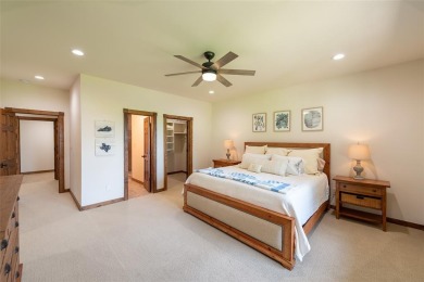 Welcome to 109 King Shore Blvd, a luxury waterfront retreat in on Cypress Creek Country Club in Texas - for sale on GolfHomes.com, golf home, golf lot