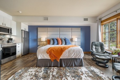 GOLF + SKI IN/OUT corner condo in the iconic Lodge at Osprey on Osprey Meadows at Tamarack Resort in Idaho - for sale on GolfHomes.com, golf home, golf lot
