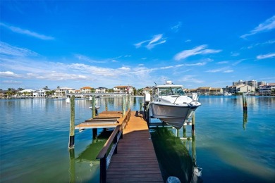 Welcome to a stunning custom waterfront home in the prestigious on Pasadena Yacht and Country Club in Florida - for sale on GolfHomes.com, golf home, golf lot