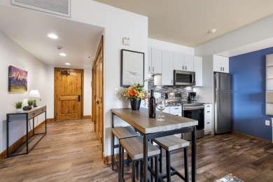 GOLF + SKI IN/OUT corner condo in the iconic Lodge at Osprey on Osprey Meadows at Tamarack Resort in Idaho - for sale on GolfHomes.com, golf home, golf lot
