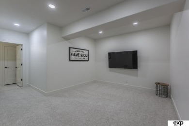 This stunning PRE-INSPECTED west-facing 2-story home sits on a 0 on Tiburon Golf Club in Nebraska - for sale on GolfHomes.com, golf home, golf lot
