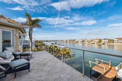 Welcome to a stunning custom waterfront home in the prestigious on Pasadena Yacht and Country Club in Florida - for sale on GolfHomes.com, golf home, golf lot