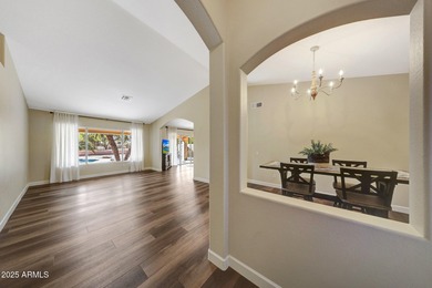 Impeccably maintained and elegantly updated, this stunning on The Legend at Arrowhead in Arizona - for sale on GolfHomes.com, golf home, golf lot