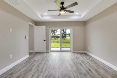 One or more photo(s) has been virtually staged. NEW CONSTRUCTION on Rotonda Golf and Country Club - Long Marsh  in Florida - for sale on GolfHomes.com, golf home, golf lot