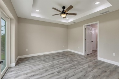 One or more photo(s) has been virtually staged. NEW CONSTRUCTION on Rotonda Golf and Country Club - Long Marsh  in Florida - for sale on GolfHomes.com, golf home, golf lot