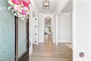 Experience Luxury Living in This Beautiful Craftsman Home! on Traditions of Braselton Golf Club in Georgia - for sale on GolfHomes.com, golf home, golf lot
