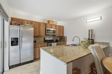 Discover this refreshed 3-bed, 2-bath townhome in Davie's on Pine Island Ridge Country Club in Florida - for sale on GolfHomes.com, golf home, golf lot