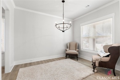 Experience Luxury Living in This Beautiful Craftsman Home! on Traditions of Braselton Golf Club in Georgia - for sale on GolfHomes.com, golf home, golf lot