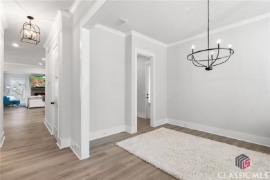 Experience Luxury Living in This Beautiful Craftsman Home! on Traditions of Braselton Golf Club in Georgia - for sale on GolfHomes.com, golf home, golf lot