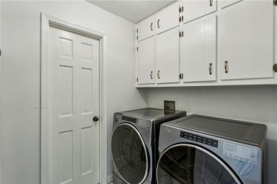 Tucked away on a large (over 1/2 acre lot) in the heart of on Indian Hills Country Club in Georgia - for sale on GolfHomes.com, golf home, golf lot