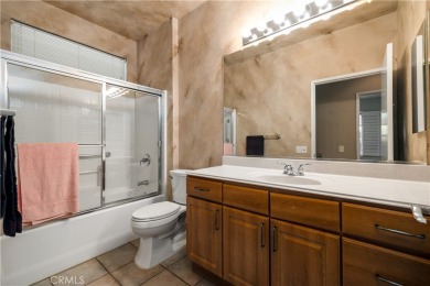 This popular St Maarten model is located in the prestigious area on Mountain Vista Golf Course At Sun City Palm Desert in California - for sale on GolfHomes.com, golf home, golf lot