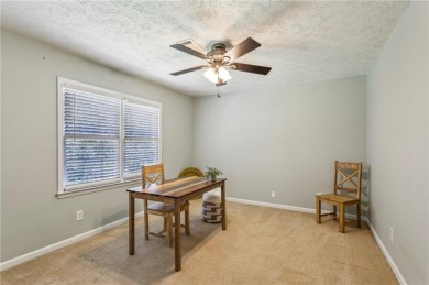 Tucked away on a large (over 1/2 acre lot) in the heart of on Indian Hills Country Club in Georgia - for sale on GolfHomes.com, golf home, golf lot