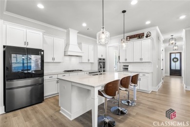 Experience Luxury Living in This Beautiful Craftsman Home! on Traditions of Braselton Golf Club in Georgia - for sale on GolfHomes.com, golf home, golf lot