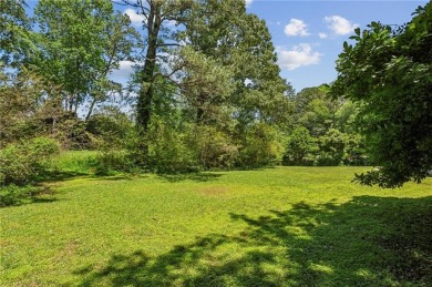 Tucked away on a large (over 1/2 acre lot) in the heart of on Indian Hills Country Club in Georgia - for sale on GolfHomes.com, golf home, golf lot