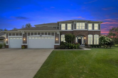 Stunning home in the highly sought-after Macatawa Legends on The Macatwa Legends Golf Course in Michigan - for sale on GolfHomes.com, golf home, golf lot