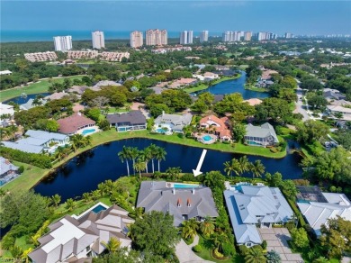 Welcome to your dream one-story lakefront pool home with over on Club at Pelican Bay Golf Course in Florida - for sale on GolfHomes.com, golf home, golf lot