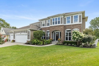 Stunning home in the highly sought-after Macatawa Legends on The Macatwa Legends Golf Course in Michigan - for sale on GolfHomes.com, golf home, golf lot